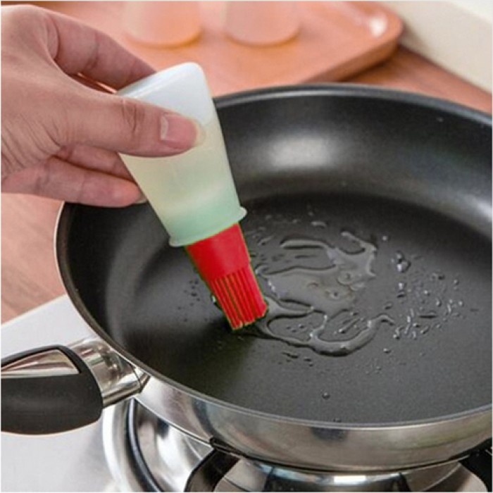 Olie bakkwast met pipet rood Olie bakkwast met pipet rood